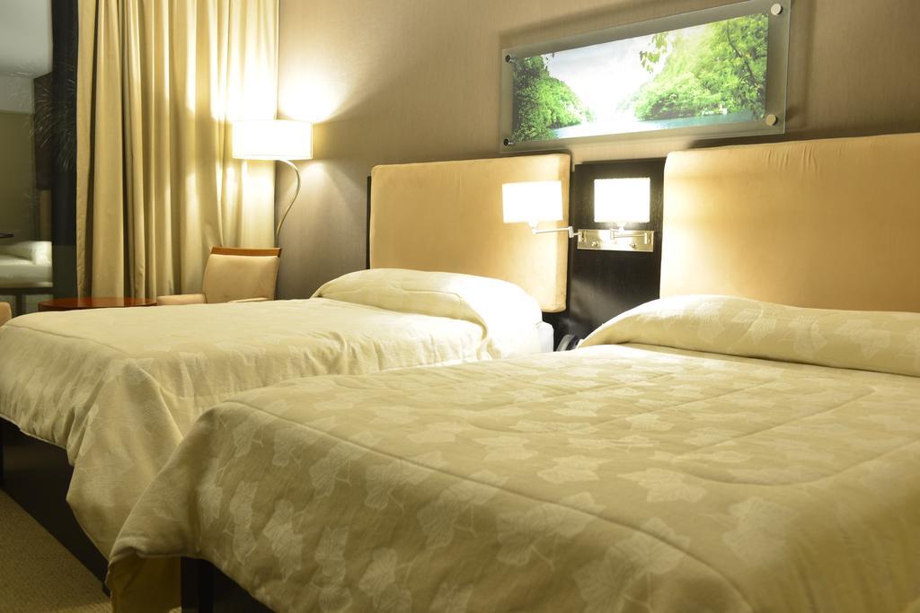 Howard Johnson Plaza Resort Lujan  Room photo