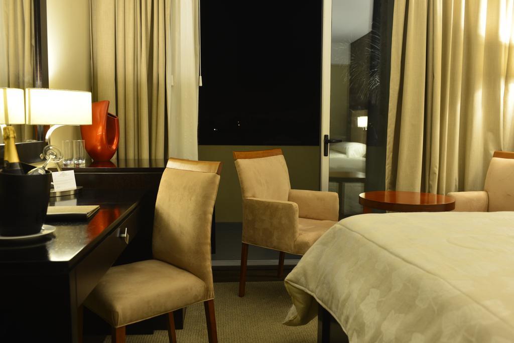 Howard Johnson Plaza Resort Lujan  Room photo